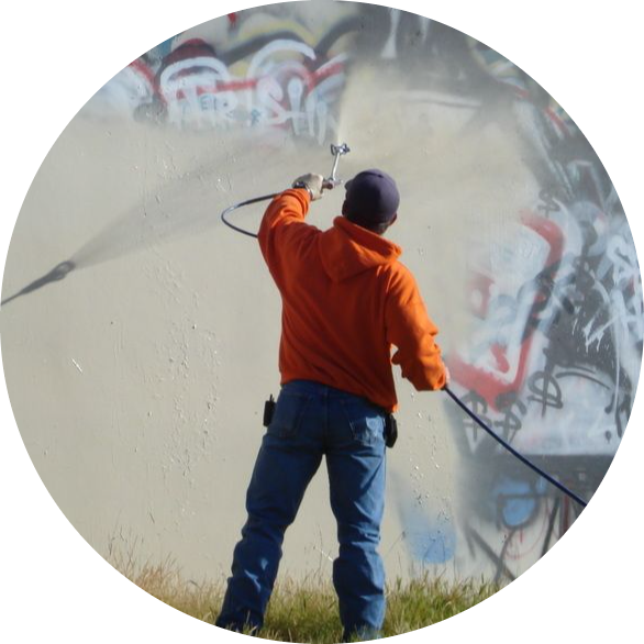 Man doing the Graffiti Removal in Seattle Area