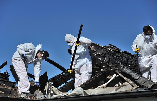 Top Down employees are restoring a house after a fire in seattle area